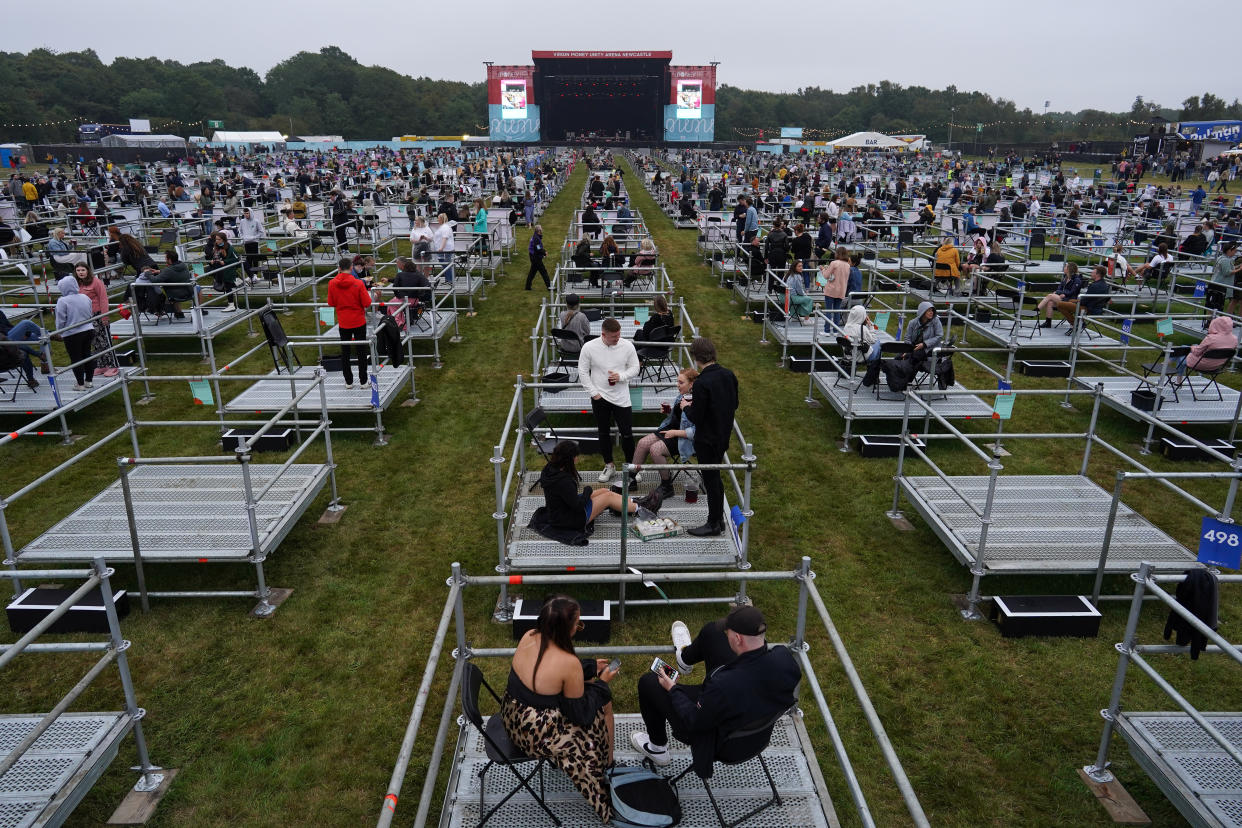 NEWCASTLE UPON TYNE, ENGLAND - AUGUST 13: Fans wait in socially distanced enclosures to see Sam Fender as he performs at the Virgin Money Unity Arena on August 13, 2020 in Newcastle upon Tyne, England. Sam Fender is the first to perform at the socially distanced music venue. (Photo by Ian Forsyth/Getty Images)