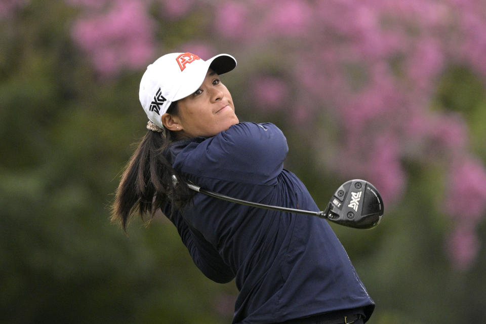 Celine Boutier, of France, tees off on the 16th hole during the third round of the Tournament of Champions LPGA golf tournament, Saturday, Jan. 22, 2022, in Orlando, Fla. (AP Photo/Phelan M. Ebenhack)