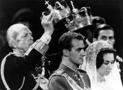 <p>Here, the two royals received their traditional wedding crowns during their marriage ceremony.</p>