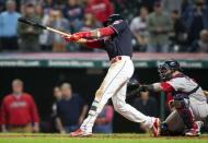 Sep 23, 2018; Cleveland, OH, USA; Cleveland Indians center fielder Greg Allen (1) hits a walk-off run during the eleventh inning to beat the Boston Red Sox at Progressive Field. Mandatory Credit: Scott R. Galvin-USA TODAY Sports