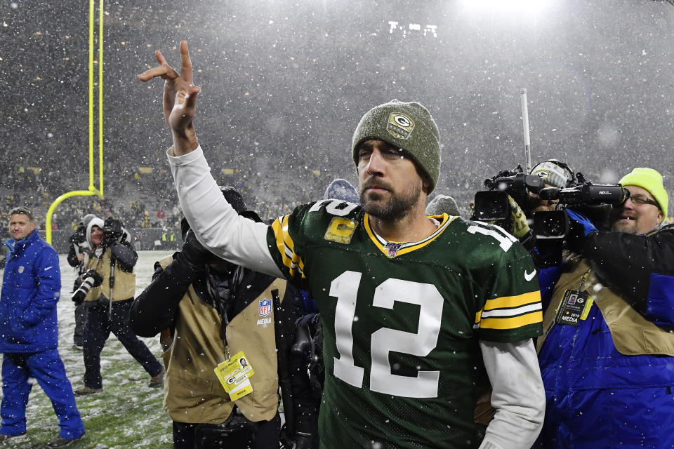 Aaron Rodgers and the Packers held on in the snow to top the Panthers. (Quinn Harris/Getty Images)