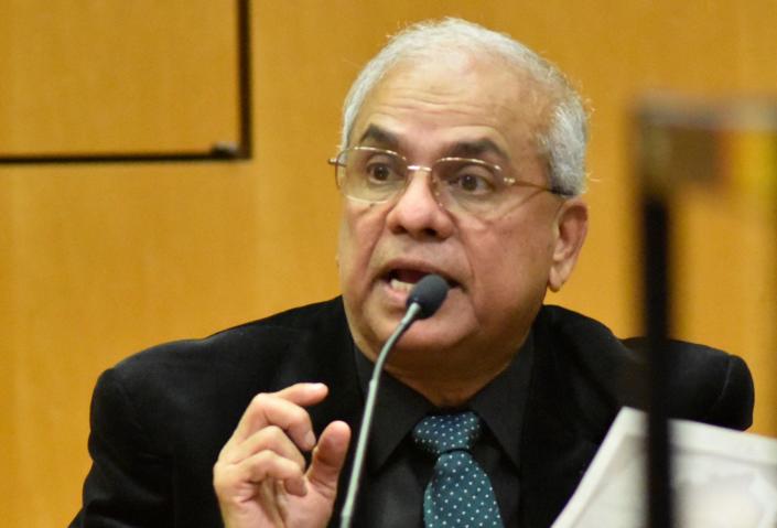 Dr. Sajid Qaiser, Brevard County medical examiner, on the stand, describing the injuries to the victim. Lakeisha Mitchell, 42, facing multiple charges, including first-degree murder in the death of 4-year-old Joy King Castro, was in the Viera courtroom of Judge Samuel Bookhardt for the second part of her bond hearing.