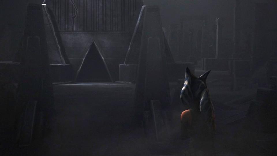 Ahsoka looks at a triangle doorway at a Sith Temple on Star Wars Rebels