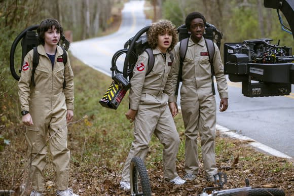 Filming of Netflix original Stranger Things 2, with three young actors dressed as Ghostbuster's characters.