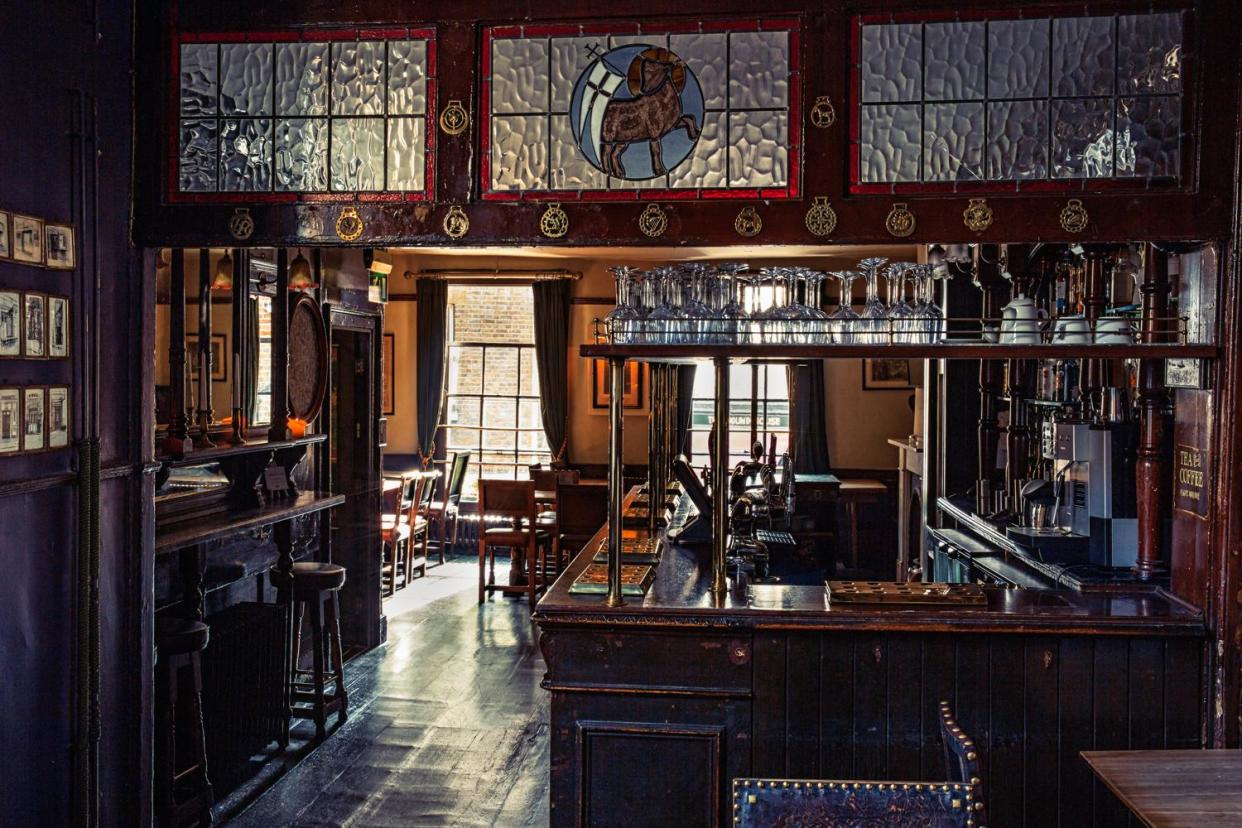 Beautiful boozer: The lavish interior of The Lamb and Flag pub in Covent Garden, taken from Great Pubs of London: Charlie Dailey