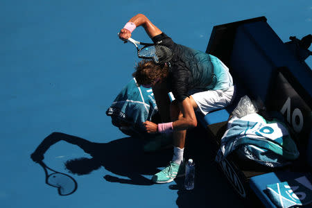 Tennis - Australian Open - Fourth Round - Melbourne Park, Melbourne, Australia, January 21, 2019. Germany's Alexander Zverev smashes his racket during his match against Canada’s Milos Raonic. REUTERS/Lucy Nicholson