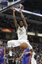 Indiana Pacers' Thaddeus Young (21) dunks during the second half of an NBA basketball game against the Detroit Pistons, Monday, April 1, 2019, in Indianapolis. Indiana won 111-102. (AP Photo/Darron Cummings)