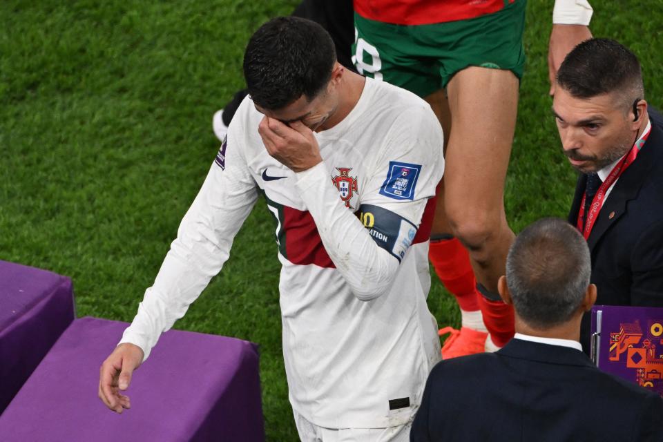 Portugal's forward #07 Cristiano Ronaldo leaves the field after losing to Morocco 1-0 in the Qatar 2022 World Cup quarter-final football match between Morocco and Portugal at the Al-Thumama Stadium in Doha on December 10, 2022. (Photo by NELSON ALMEIDA / AFP) (Photo by NELSON ALMEIDA/AFP via Getty Images)