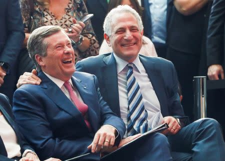 Sidewalk Labs CEO Dan Doctoroff (R) smiles with Toronto Mayor John Tory during a press conference where Alphabet Inc, the owner of Google, announced the project "Sidewalk Toronto", that will develop an area of Toronto's waterfront using new technologies to develop high-tech urban areas in Toronto, Ontario, Canada October 17, 2017. REUTERS/Mark Blinch