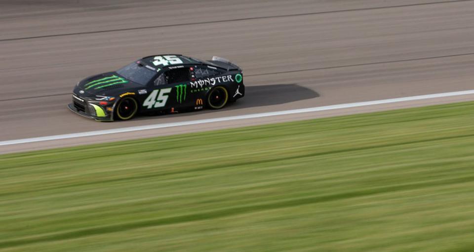 KANSAS CITY, KANSAS - MAY 05: Tyler Reddick, driver of the #45 Monster Energy Toyota, and Bubba Wallace, driver of the #23 MoneyLion Toyota, race during the NASCAR Cup Series AdventHealth 400 at Kansas Speedway on May 05, 2024 in Kansas City, Kansas. (Photo by Sean Gardner/Getty Images)