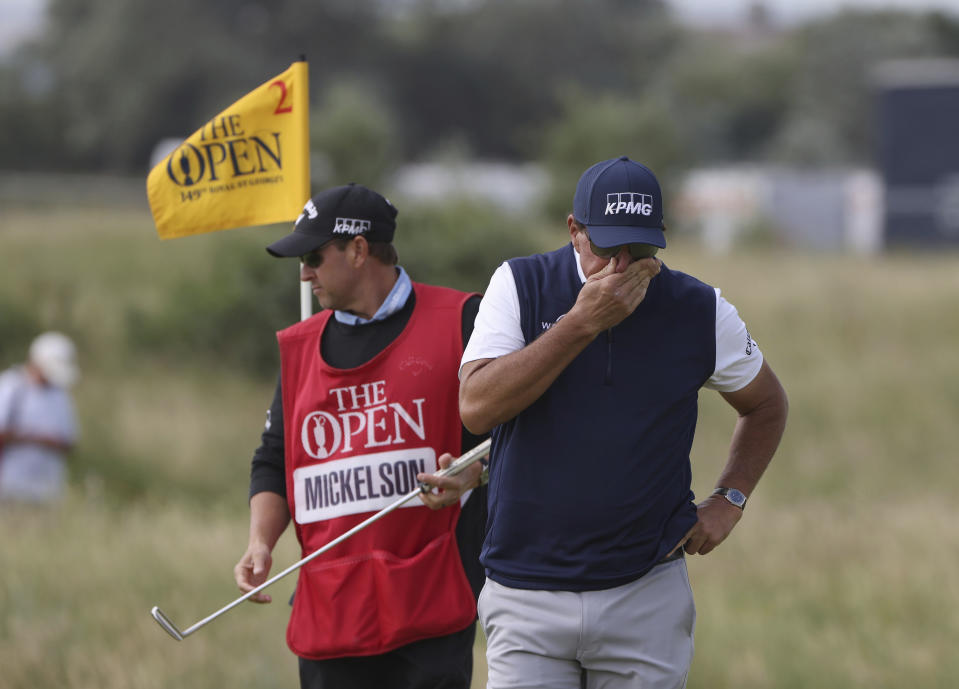 United States' Phil Mickelson reacts to his putting on the 2nd green during the second round of the British Open Golf Championship at Royal St George's golf course Sandwich, England, Friday, July 16, 2021. (AP Photo/Ian Walton)