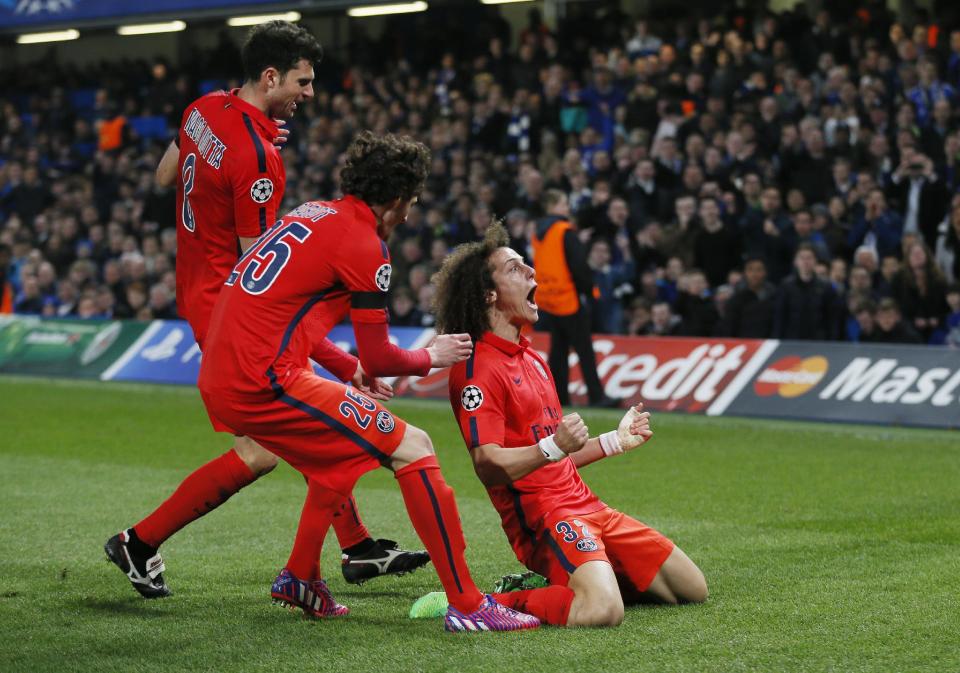 Football - Chelsea v Paris St Germain - UEFA Champions League Second Round Second Leg - Stamford Bridge, London, England - 11/3/15 David Luiz celebrates with team mates after scoring the first goal for PSG Reuters / Stefan Wermuth Livepic EDITORIAL USE ONLY.