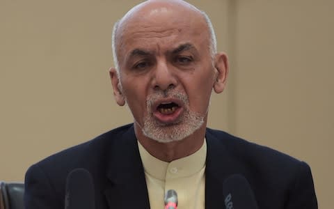 Afghan President Ashraf Ghani has moved to open talks with Taliban forces - Credit: SHAH MARAI/AFP