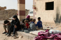 Syrian women and children arrive in the northern area of Deir al-Zor, Syria September 24,2017. REUTERS/ Rodi Said