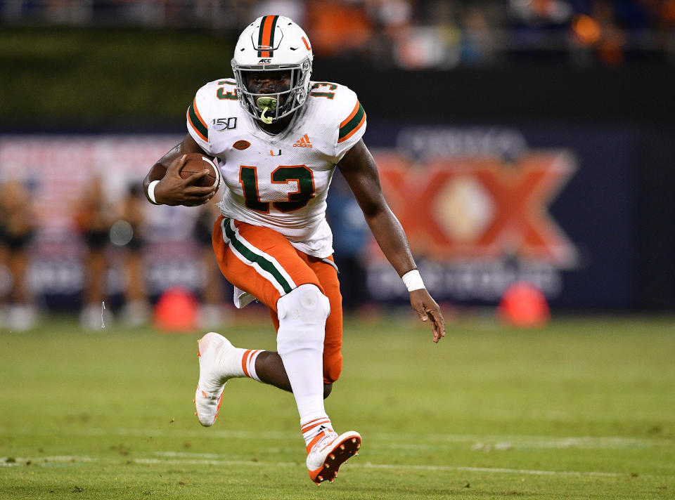 Miami (Fla.) RB DeeJay Dallas turned to a sports psychiatrist to help his fumbling issue. (Photo by Mark Brown/Getty Images)