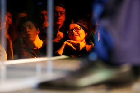 People listen to Dutch Green Party ( Groen Links) leader Jesse Klaver during a meeting for the 2017 Dutch election in the AFAS theater in Amsterdam, Netherlands, March 9, 2017. REUTERS/Michael Kooren