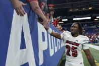 Louisville running back Jawhar Jordan greets fans after an NCAA college football game against Indiana, Saturday, Sept. 16, 2023, in Indianapolis. Louisville won 21-14. (AP Photo/Darron Cummings)
