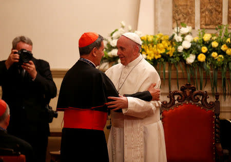 Pope Francis and Bogota Archbishop Ruben Salazar Gomez chat during a meeting with Executive Committee of the Latin Episcopal council CELAM in Bogota, Colombia September 7, 2017. REUTERS/Stefano Rellandini