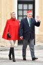 <p>Princess Charlene was seasonal in a bright red capelet for the Christmas gifts distribution in 2017.</p>