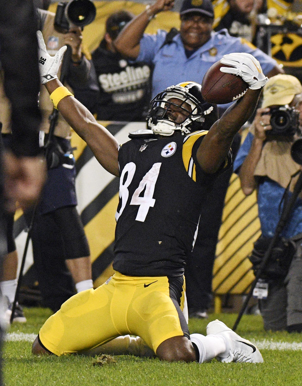 Pittsburgh Steelers wide receiver Antonio Brown (84) celebrates a touchdown during the first half of an NFL football game against the Baltimore Ravens in Pittsburgh, Sunday, Sept. 30, 2018. (AP Photo/Don Wright)