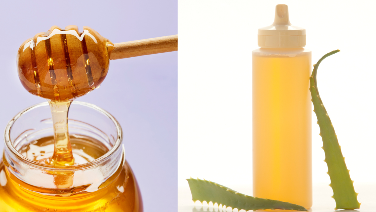 a glass jar with a liquid in it and a straw