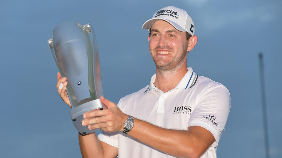 Pictured here, Patrick Cantlay poses with the trophy after winning the BMW Championship.