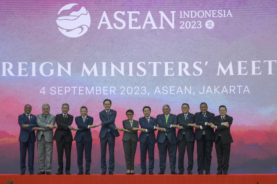 From left to right, Malaysia's Foreign Minister Zambry Abd Kadir, Philippines' Foreign Secretary Enrique Manalo, Singapore's Foreign Minister Vivian Balakrishnan, Thailand's Permanent Secretary to the Ministry of Foreign Affairs Sarun Charoensuwan, Vietnam's Deputy Foreign Minister Do Hung Viet, Indonesia's Foreign Minister Retno Marsudi, Laos' Foreign Minister Saleumxay Kommasith, Brunei's Foreign Minister Erywan Yusof, Cambodia's Foreign Minister Sok Chenda Sophea, East Timor's Foreign Minister Bendito dos Santos Freitas, and ASEAN Secretary General Kao Kim Hourn, pose for a family photo during the Association of Southeast Asian Nations (ASEAN) Foreign Ministers' Meeting ahead of the ASEAN Summit, at the ASEAN Secretariat in Jakarta, Indonesia, Monday, Sept. 4, 2023. (Bay Ismoyo/Pool Photo via AP)
