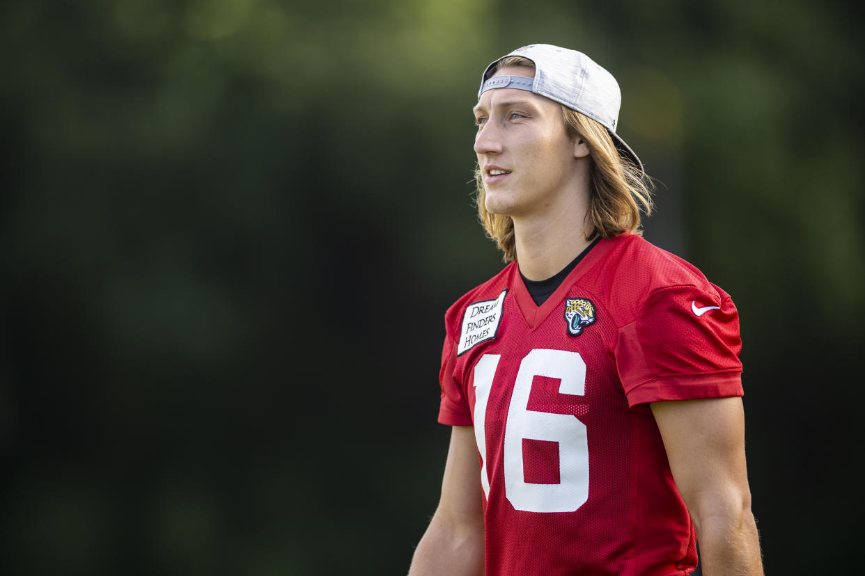 JACKSONVILLE, FLORIDA - JULY 26: Trevor Lawrence #16 of the Jacksonville Jaguars looks on during training camp on July 26, 2022 at Episcopal High School in Jacksonville, Florida. (Photo by James Gilbert/Getty Images)