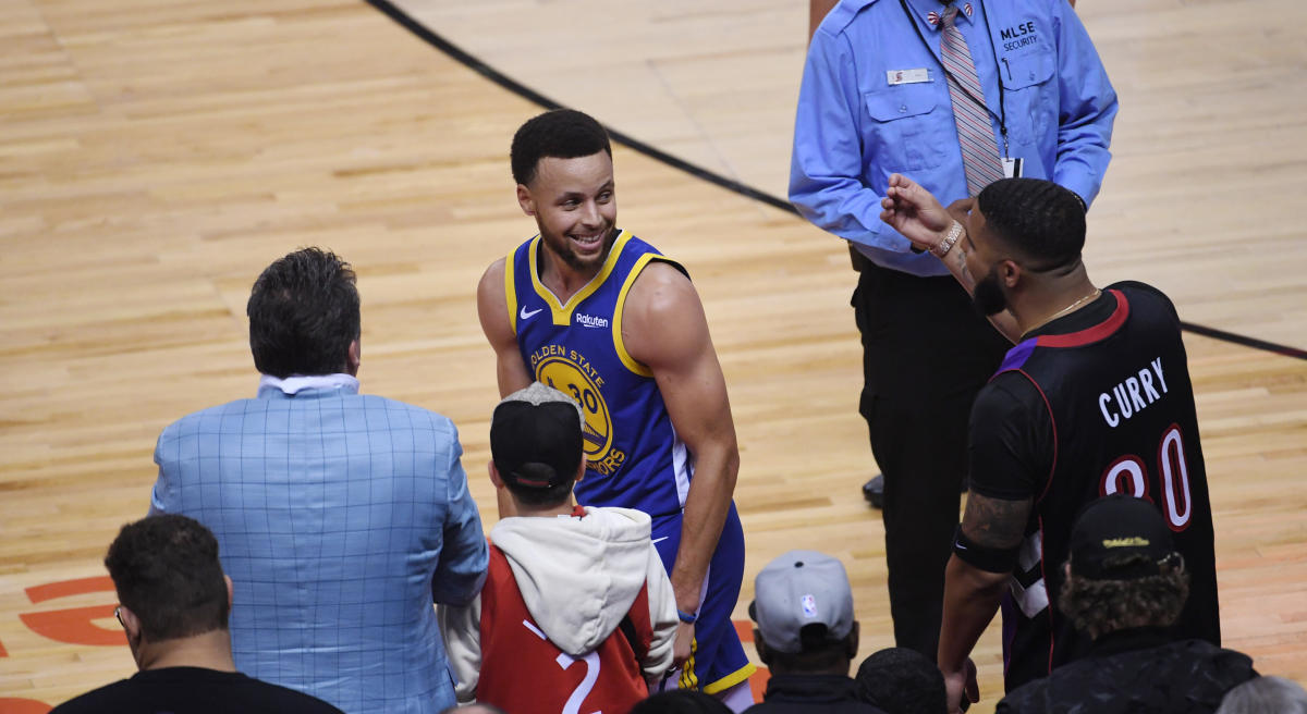 Drake Trolls Steph Curry At NBA Finals, Wears Father's Raptors Jersey &  Says He Has Curry's Hair Lint For Sale - theJasmineBRAND