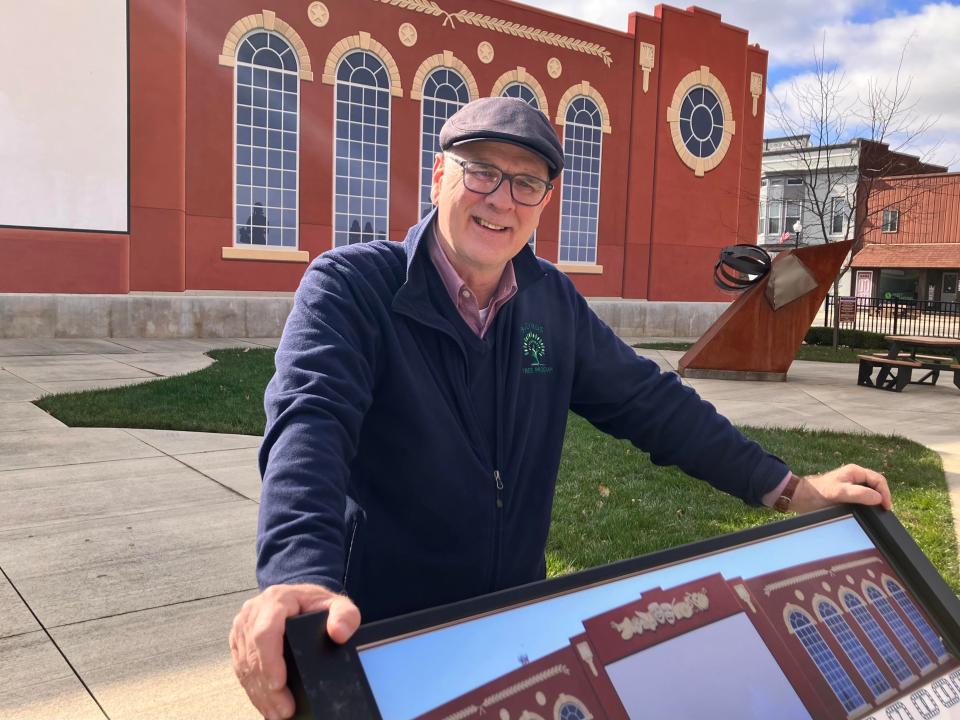 Bucyrus Mayor Jeff Reser demonstrates the new signs in the Schines Art Park, Tuesday, Nov. 7, 2023.