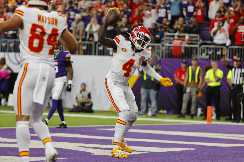 Kansas City Chiefs wide receiver Rashee Rice (4) celebrates after catching an 8-yard touchdown pass during the second half of an NFL football game against the Minnesota Vikings, Sunday, Oct. 8, 2023, in Minneapolis. (AP Photo/Bruce Kluckhohn)