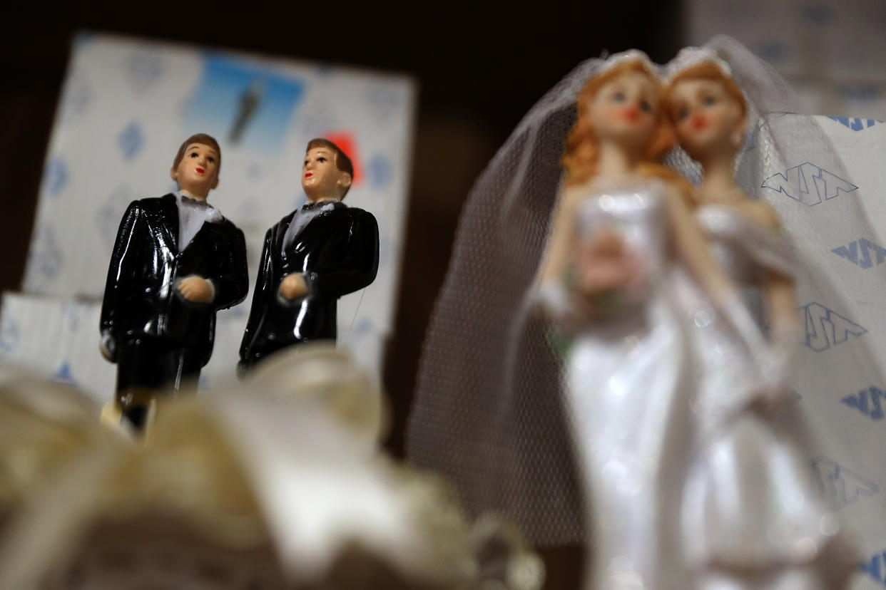 Same-sex marriage cake toppers at a bakery.