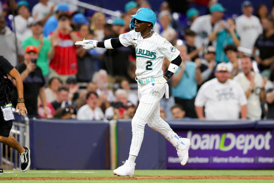 MIAMI, FLORIDA - MARCH 31: Jazz Chisholm Jr. #2 of the Miami Marlins celebrates after hitting a home run against the New York Mets during eighth inning at loanDepot park on March 31, 2023 in Miami, Florida. (Photo by Megan Briggs/Getty Images)