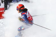 Italy's Federica Brignone celebrates at the finish area during an alpine ski, World Cup women's giant slalom in Sestriere, Italy, Saturday, Jan. 18, 2020. (AP Photo/Alessandro Trovati)