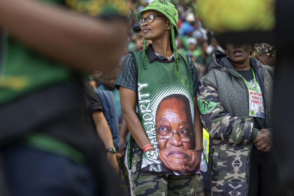 Supporters wait for former South African President Jacob Zuma to arrive at Orlando stadium in the township of Soweto, Johannesburg, South Africa, for the launch of his newly formed uMkhonto weSizwe (MK) party's manifesto Saturday, May 18, 2024. Zuma, who has turned his back on the African National Congress (ANC) he once led, will face South African President Cyril Ramaphosa, who replaced him as leader of the ANC in the general elections later in May. (AP Photo/Jerome Delay)