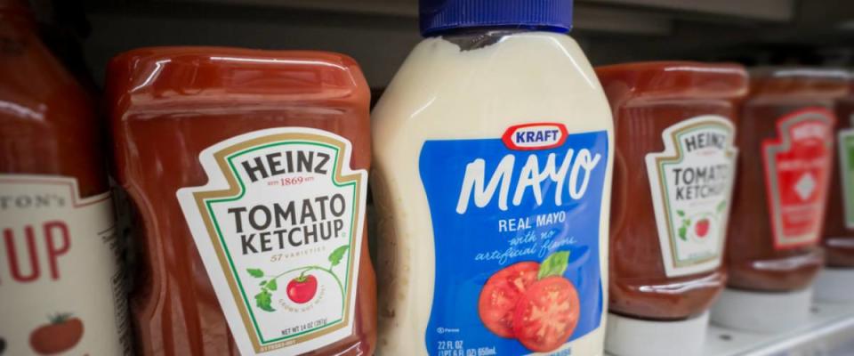 Bottles of Kraft Heinz mayonnaise and ketchup on a supermarket shelf in New York