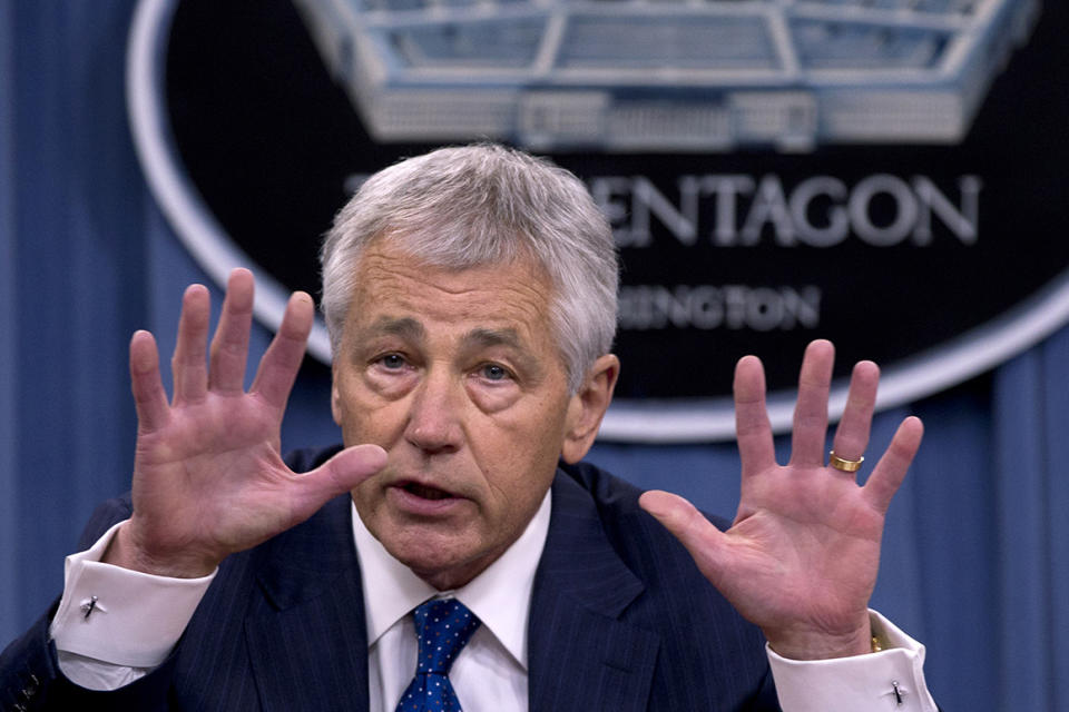 Defense Secretary Chuck Hagel gestures as he speaks during a news conference at the Pentagon, Wednesday, April 10, 2013, about the fiscal year 2014 defense budget. (AP Photo/Carolyn Kaster)