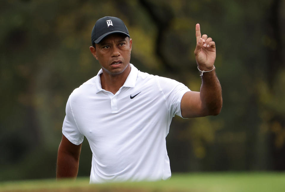 AUGUSTA, GEORGIA - APRIL 06: Tiger Woods of the United States gestures during a practice round prior to the Masters at Augusta National Golf Club on April 06, 2022 in Augusta, Georgia. (Photo by Jamie Squire/Getty Images)