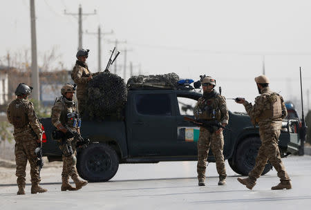 Afghan security forces keep watch at the site of a suicide attack in Kabul, Afghanistan October 29, 2018. REUTERS/Omar Sobhani