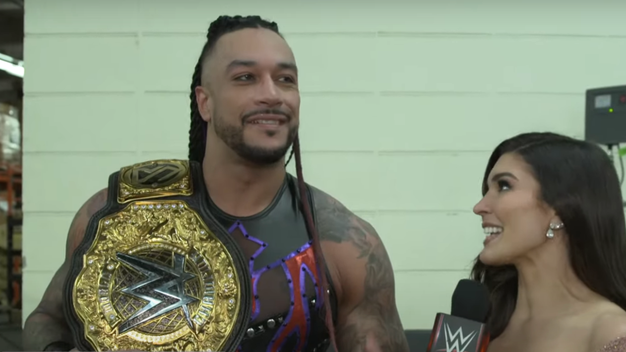  Damian Priest gives an interview backstage to Cathy Kelley after winning The World Heavyweight Championship At WrestleMania. 