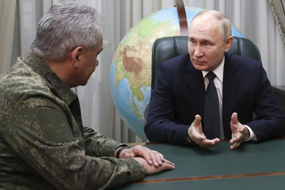 Russian President Vladimir Putin, right, gestures while speaking to Russian Defense Minister Sergei Shoigu at the headquarters of Russia's Southern Military District in Rostov-on-Don, Russia, on Thursday, Nov. 9, 2023. (Gavriil Grigorov, Sputnik, Kremlin Pool Photo via AP)