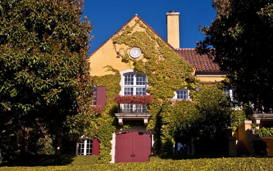 The ivy-covered exterior of Jordan Vineyard &amp; Winery