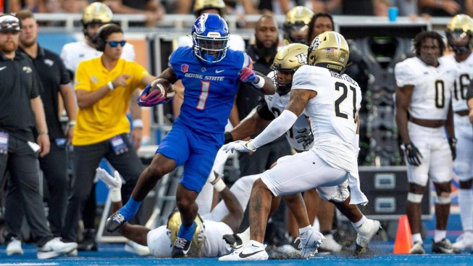 Boise State running back Jambres Dubar picks up a first down on a long run down the UCF sideline in the Broncos’ home opener, Saturday, Sept. 9, 2023.