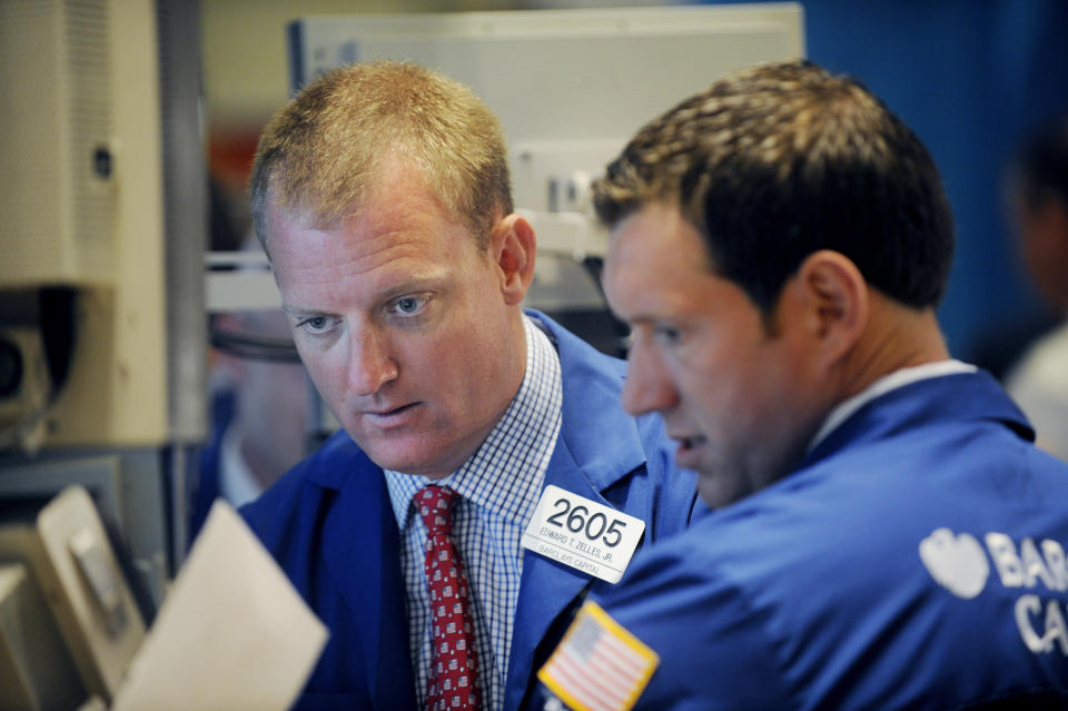 Barclays Capital traders work on the floor of the New York Stock Exchange. (AP Photo/Henny Ray Abrams)