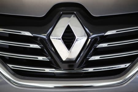 FILE PHOTO: A logo is seen on a Renault Espace car pictured at a dealership in Les Sorinieres near Nantes, France, November 24, 2015. REUTERS/Stephane Mahe