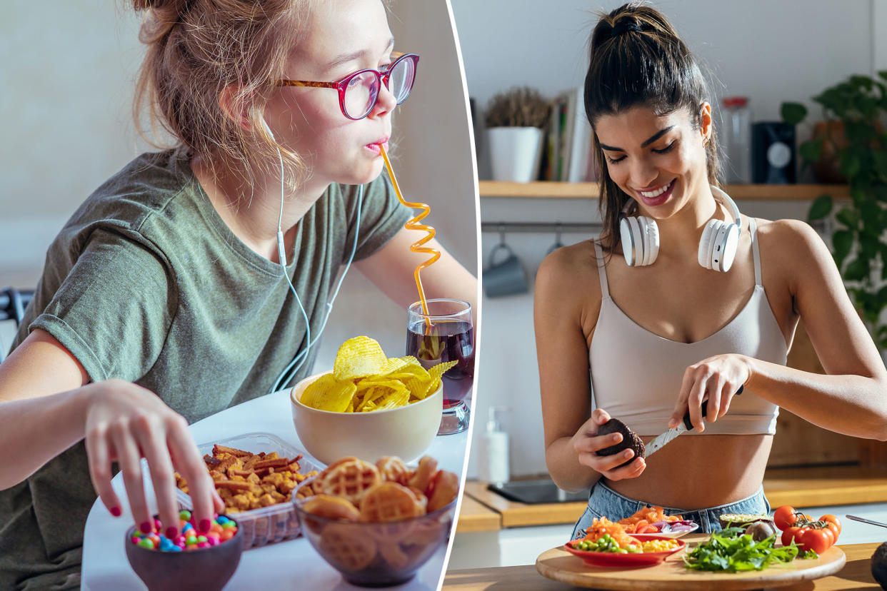 Girl working on computer while eating an unhealthy meal consisting of chips, crackers, candy, waffles, and cola.