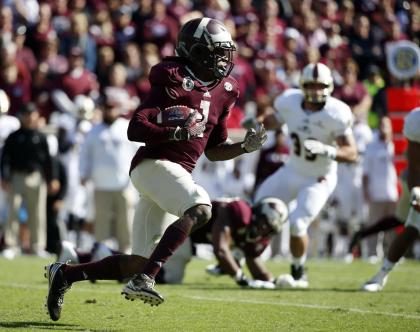 Texas A&M running back Brandon Williams (1) finds running room against Louisiana Monroe in the first half of an NCAA college football game, Saturday, Nov. 1, 2014, in College Station, Texas. (AP Photo/Tony Gutierrez)