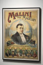 A lithograph poster featuring Malini the Magician, from the Ricky Jay Collection, is displayed at Sotheby's on Friday, Oct. 22, 2021, in New York. The widow of the sleight-of-hand artist, card shark, author, actor and scholar turned over nearly 2,000 curiosities Jay collected to Sotheby's for an unusual auction. Divided into 634 lots, it's the focus of a live auction Wednesday and Thursday. (Photo by Charles Sykes/Invision/AP)