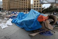 Pulled-down tents are seen in Beirut