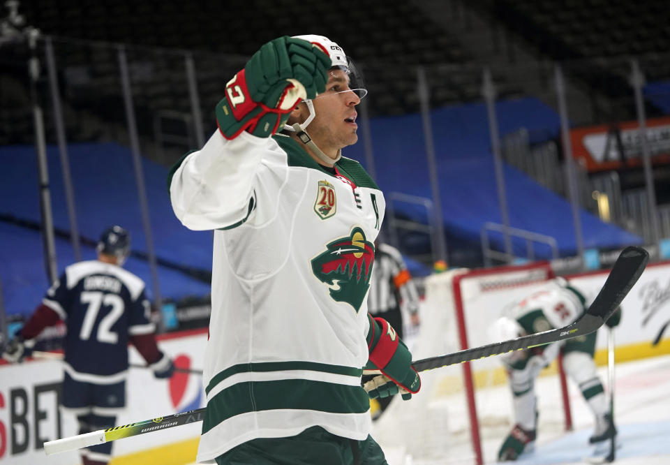 Minnesota Wild left wing Zach Parise reacts after scoring a goal against the Colorado Avalanche in the second period of an NHL hockey game Wednesday, Feb. 24, 2021, in Denver. (AP Photo/David Zalubowski)